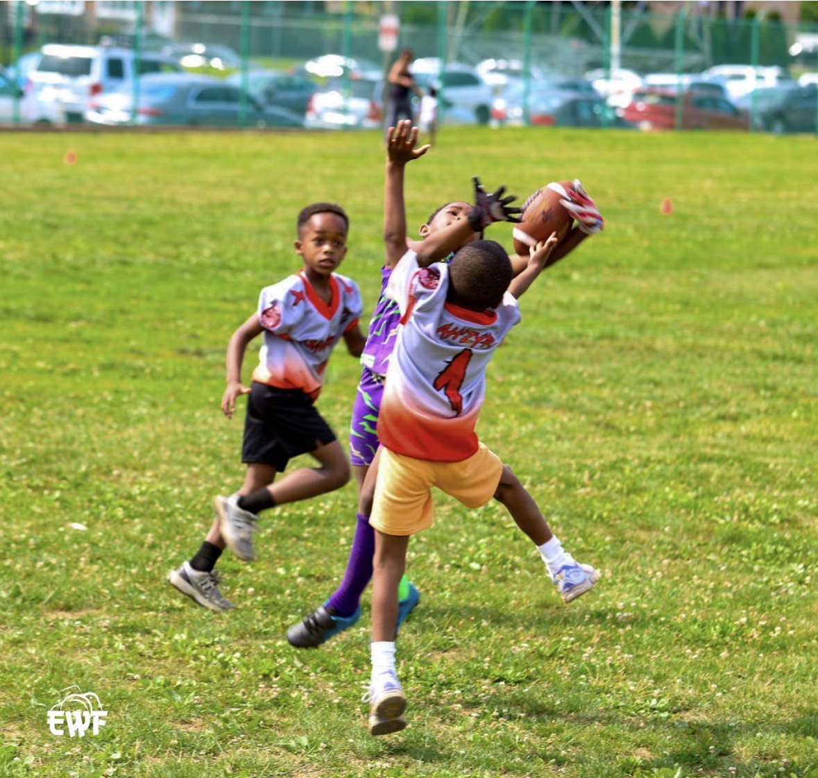 Young athletes making a catch during game