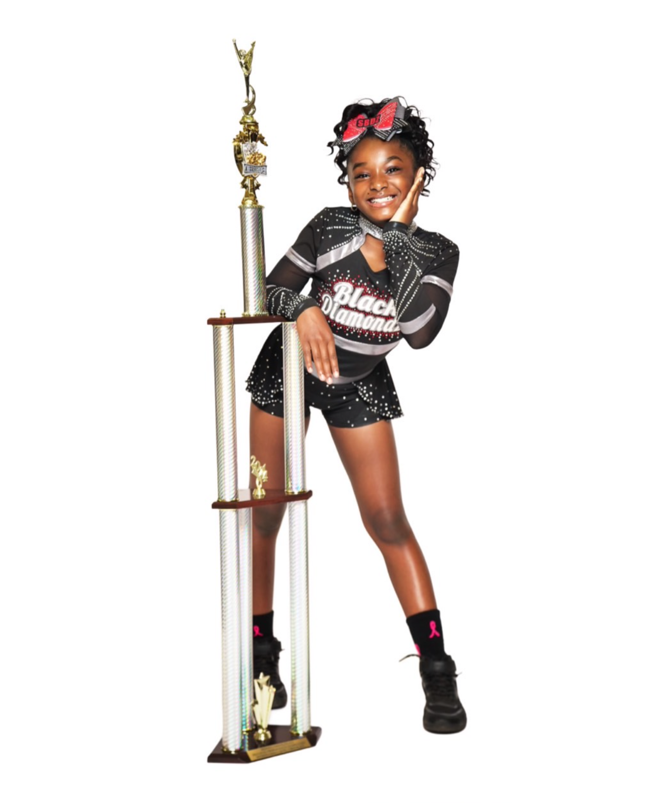 Black Diamonds cheerleader with tall trophy